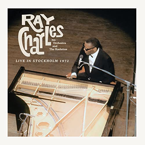 Ray Charles at a piano with microphone, album cover for "Live In Stockholm 1972".