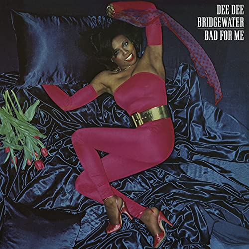 Dee Dee Bridgewater album cover: woman in pink pose on bedding.