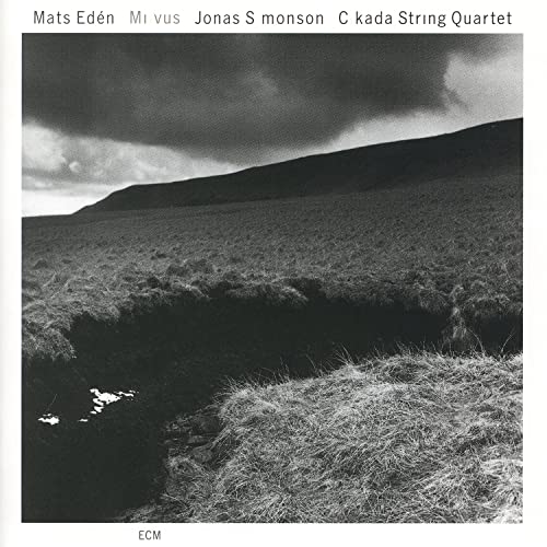 Black and white CD cover with a landscape of hills and stormy sky.