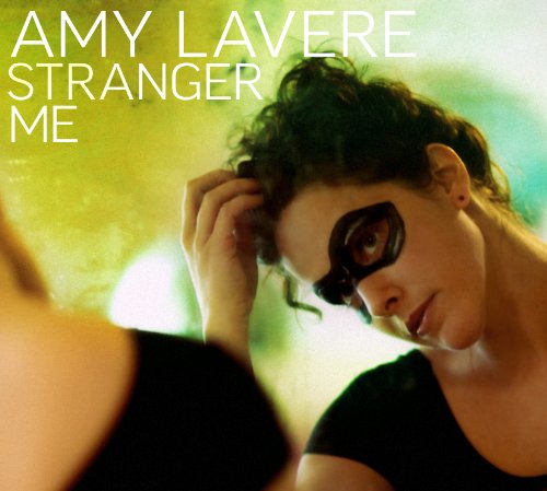 "A CD cover featuring a woman with a black mask over one eye."