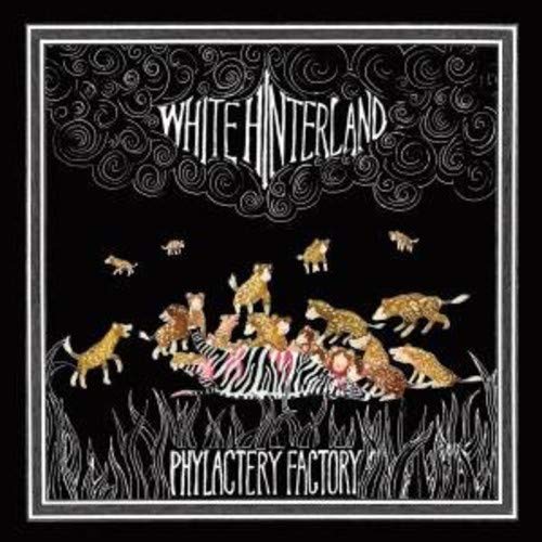 Album cover art featuring a zebra and small animals against a black background.