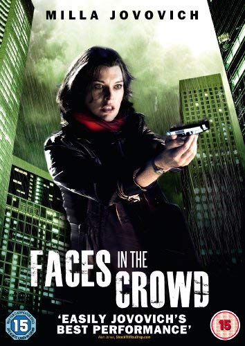 Milla Jovovich holds a gun, standing in a rainy city scene.