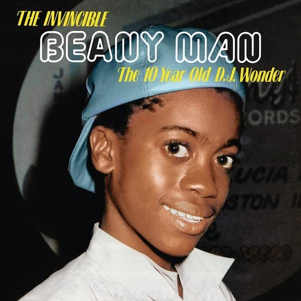 CD cover featuring a young boy wearing a blue bandana and headphones.