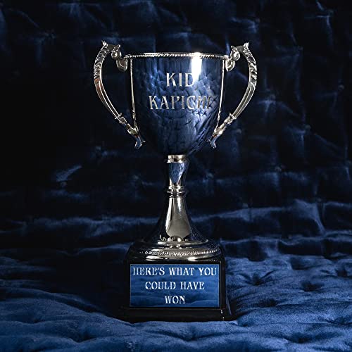 Silver trophy with "Kid Kapichi" and album title on a blue background.