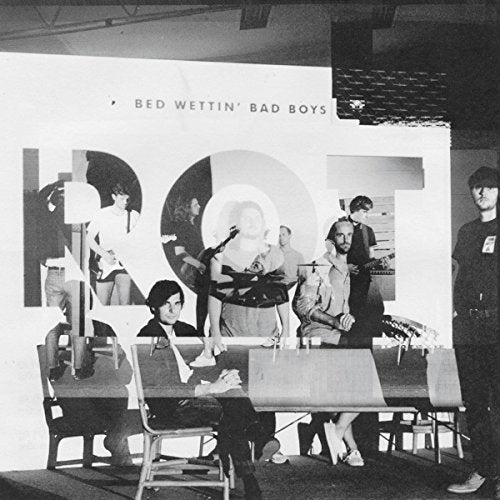 Black and white album cover with collage of people and shapes.