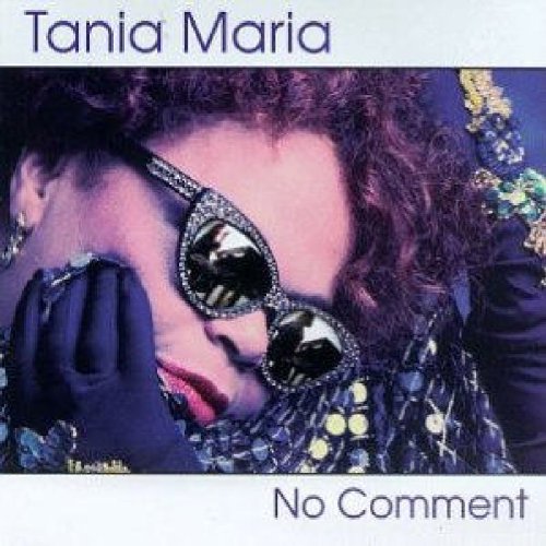 "Album cover featuring a woman wearing sunglasses and gloves, with 'Tania Maria' and 'No Comment' text."