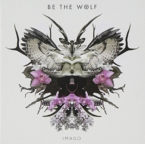 CD cover with symmetrical butterfly-skull-antler floral collage, titled "Imago".