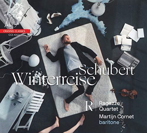 CD cover: man lying on rug with musical instruments and sheet music.
