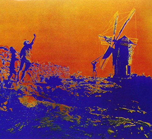 "Pink Floyd 'More' CD cover featuring blue silhouettes against an orange background."