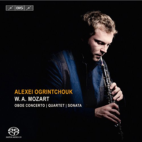 CD cover featuring a man holding an oboe, against a black background.