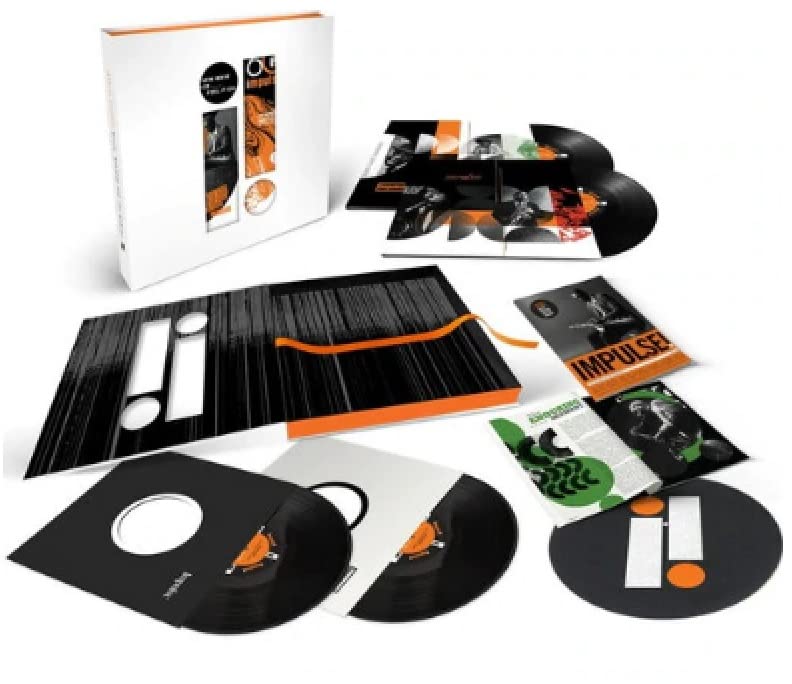 Vinyl record box set with black records and orange accents.