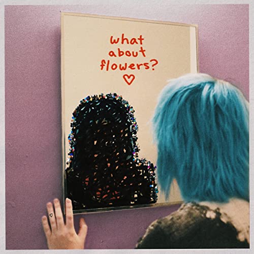 CD cover with text, dark glitter, and a person with blue hair.