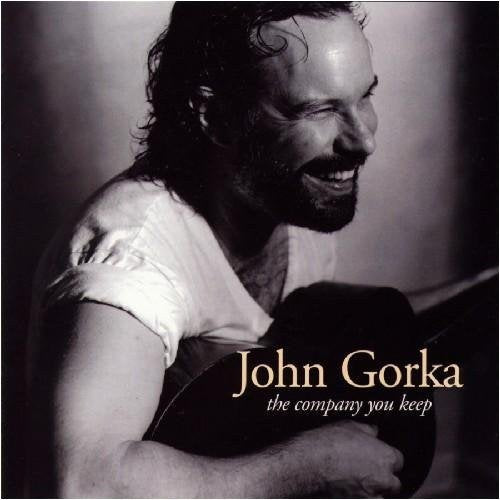 "Black and white album cover with John Gorka holding a guitar."