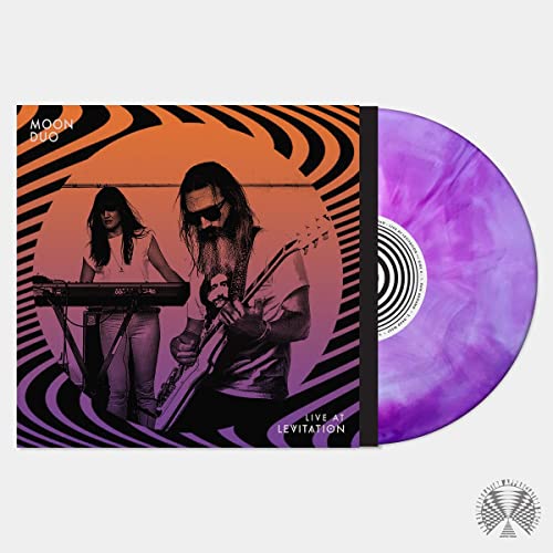 Vinyl record of Moon Duo’s “Live At LEVITATION” with swirling cover art.