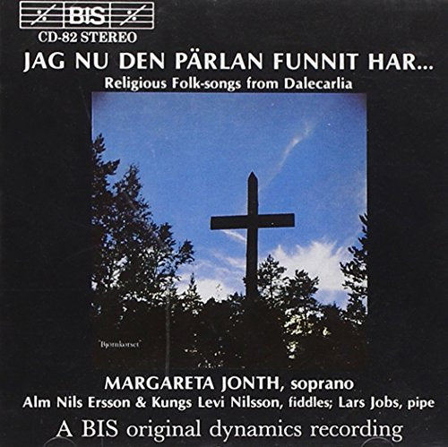 A CD cover featuring a cross against trees and a blue sky.