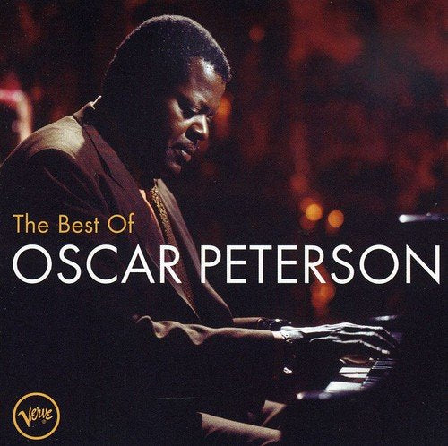 "Oscar Peterson playing piano on a CD case cover with title text."