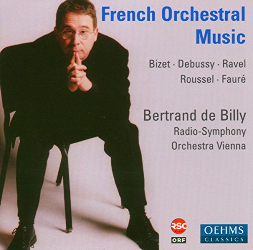 CD cover with man in black, crouching, and finger to lips, against light background.
