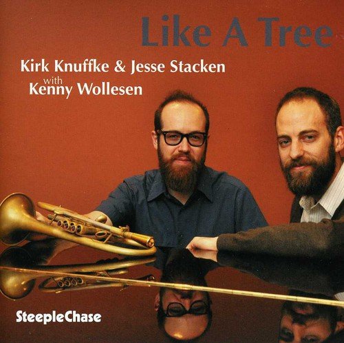 "CD cover featuring two men and a trumpet, with orange background and text."