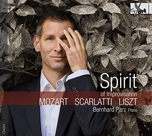 CD cover featuring a man in a suit with hand on his face.
