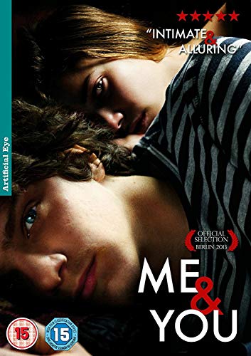 Two young people lie close together in a close-up film poster for Me and You.