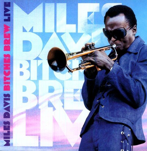 Album cover featuring Miles Davis playing trumpet, wearing sunglasses and a blue suit.