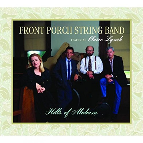 "CD cover with four musicians sitting on a couch, formal attire, light green swirly background."