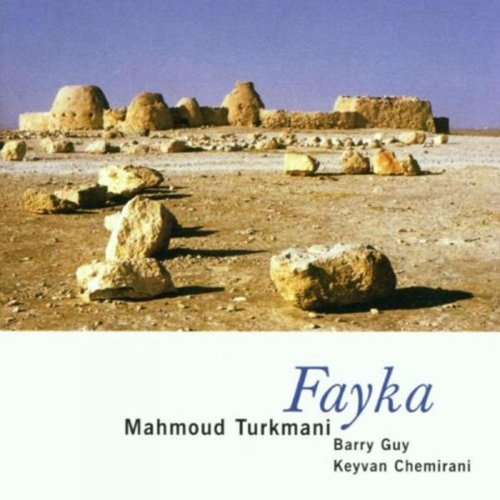 "CD cover featuring a desert landscape with rocks and a clear blue sky."