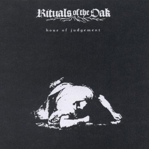 CD cover: dark background with a figure kneeling in distress.