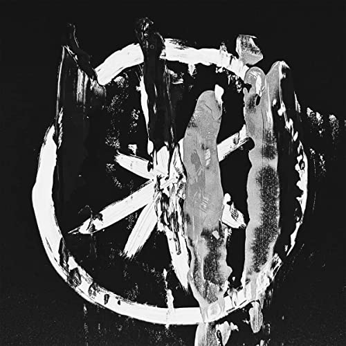 Black and white abstract painting of a circular, organic shape.