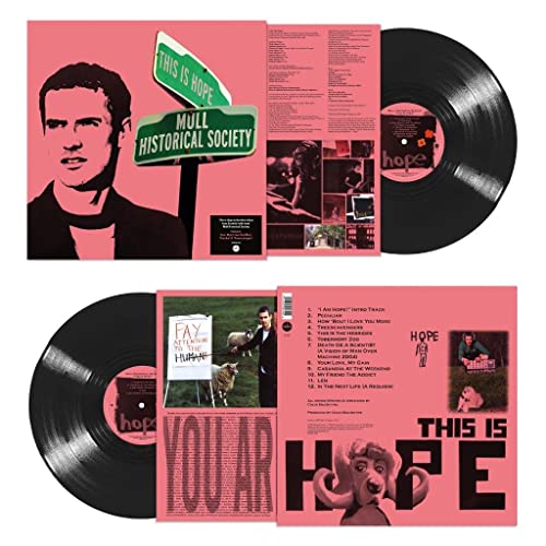 Vinyl record and pink album cover featuring a man and "This Is Hope" text.