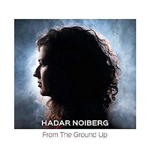 A woman's silhouette against a smoky background with text "Hadar Noiberg - From The Ground Up".