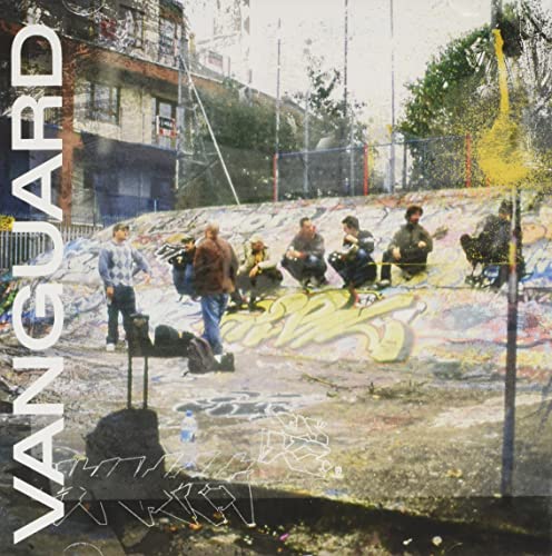 CD cover: group of people seated amidst colorful street art and graffiti.