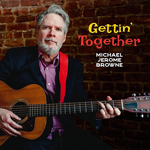 Michael Jerome Browne with acoustic guitar, album cover for “Gettin’ Together.”
