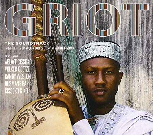 "Album cover featuring a man holding a stringed instrument, wearing traditional attire."