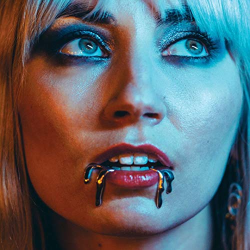 Close-up of a woman with silver dripping from her open mouth.