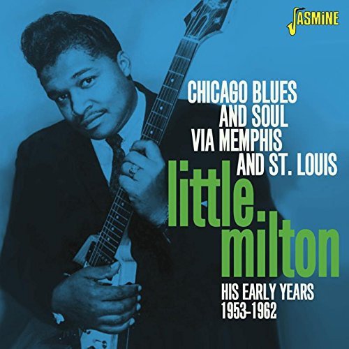 "Album cover featuring a man holding a guitar, with text overlay."