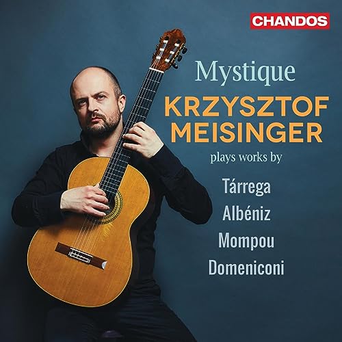 Krzysztof Meisinger with a classical guitar, album cover for "Mystique".