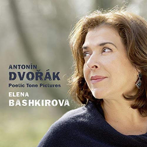 "CD cover featuring a woman with brown hair and blue top, outdoors background."