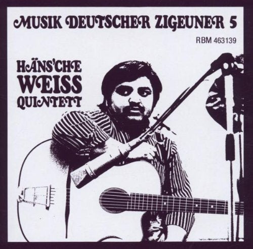"Album cover with a man holding a guitar and microphone."