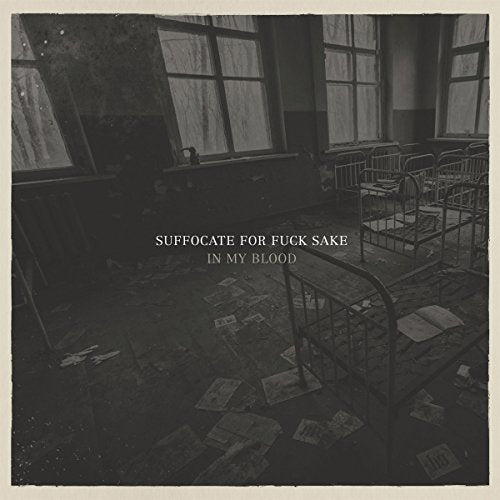 "Dark, abandoned room with metal beds and scattered papers, vinyl album cover."