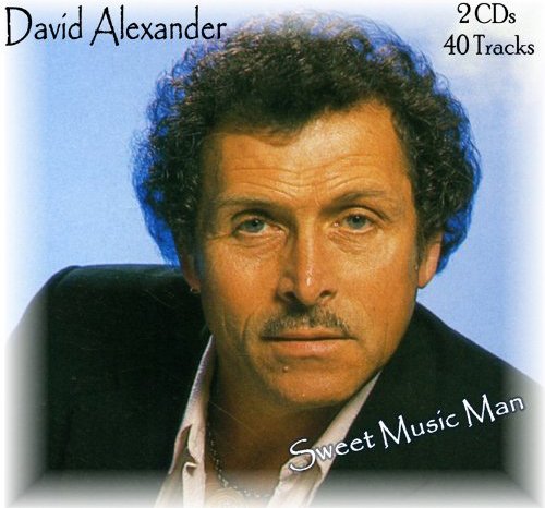 "CD cover with a man having curly hair and a moustache."
