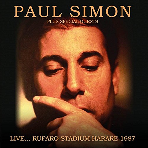 CD cover featuring a close-up portrait of Paul Simon from a 1987 concert.