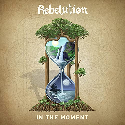 The image is an album cover featuring an hourglass with a nature scene inside.