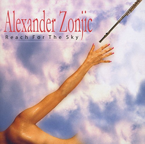The image is a CD cover for "Reach For The Sky" by Alexander Zonjic. The cover features a person reaching up towards a flute against a cloudy sky. * **Title and Artist** * The title "Reach For The Sky" is written in black text at the top of the image. * The artist's name, "Alexander Zonjic", is written in red text above the title. * **Main Image** * A person is