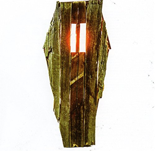 The image depicts a coffin-shaped object with a glowing light inside, against a white background. Alt text: Coffin-shaped object with glowing light inside, on a white background.