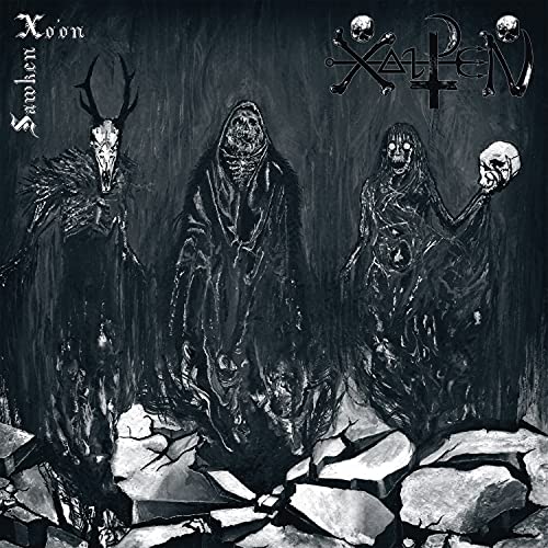 Dark album cover featuring ghostly figures and skeletal imagery.