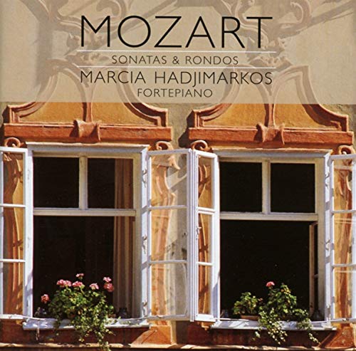 CD cover featuring a window scene and text: "Mozart, Marcia Hadjimarkos.