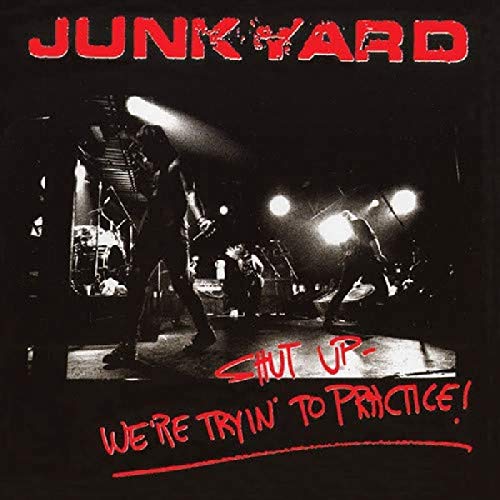 "Album cover with a black-and-white band photo and red handwritten-style text on a black background."