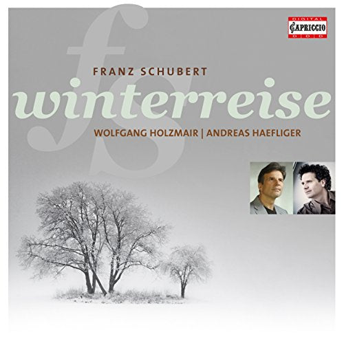 CD cover for Schubert's "Winterreise" with bare trees and headshots of two men.