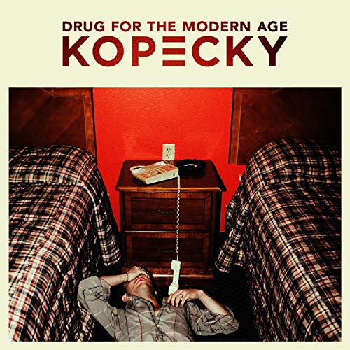Album cover: man with phone, beds, red wall, and wooden nightstand.
